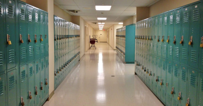 school hallway with lockers on either side