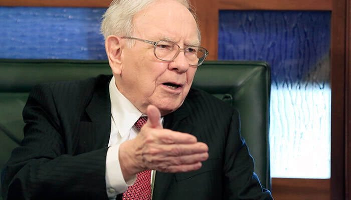FILE - In this May 4, 2015 file photo, Berkshire Hathaway Chairman and CEO Warren Buffett speaks during an interview with Liz Claman on the Fox Business Network in Omaha, Neb. Berkshire Hathaway reports quarterly financial results on Friday, Aug. 7, 2015. (AP Photo/Nati Harnik, File)