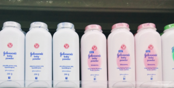 bottles of Johnson's baby powder on a shelf