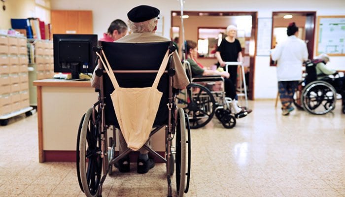 Nursing home residents in wheelchairs