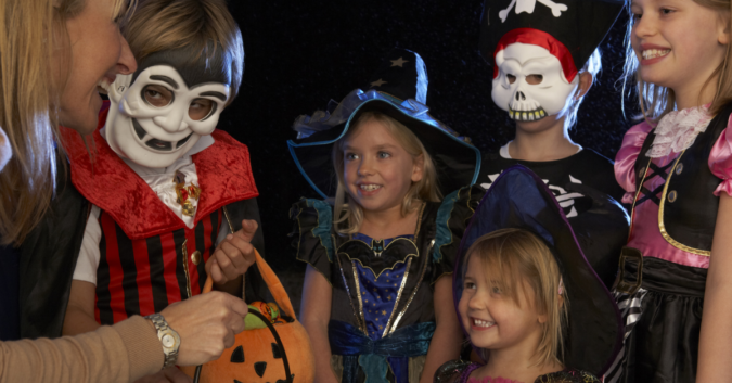 kids celebrating halloween trick or treating