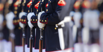 A line of U.S. Marines in uniform