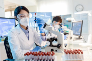 Lab scientist checking blood samples