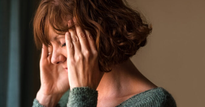 Woman with a headache from a meningioma brain tumor