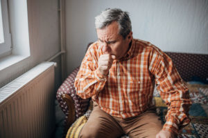 Man coughing