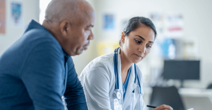 Doctor talking with patient