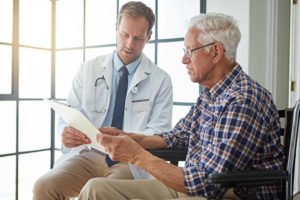 Doctor going over paperwork with patient