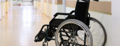 Wheelchair left in an empty nursing home hallway