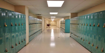 empty school hallway with lockers