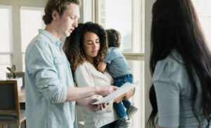 A couple with a young child consults with a lawyer