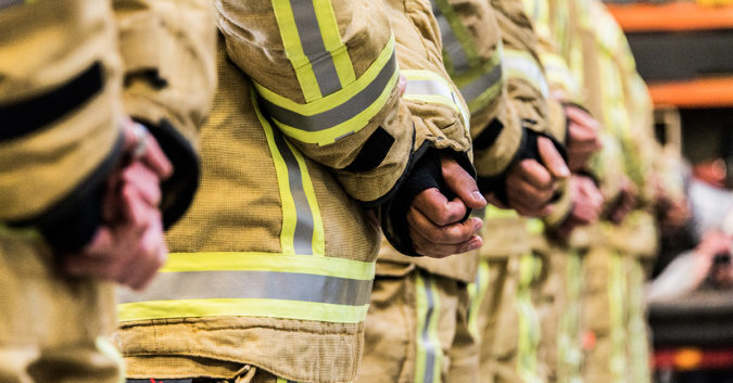 Firefighters standing together for firefighter cancer awareness month