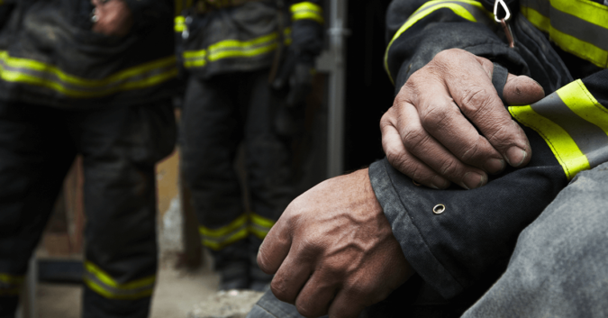 close up of a group of firefighters in uniform