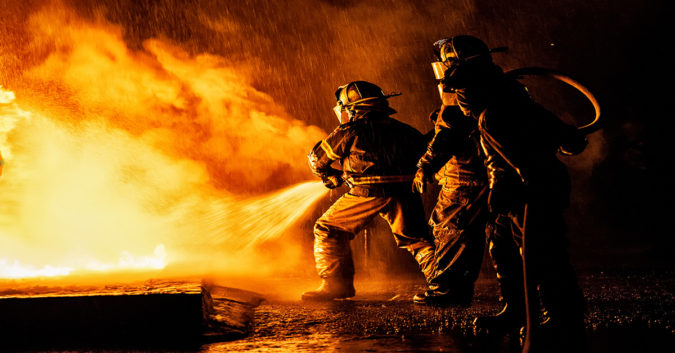 firefighters putting out a fire