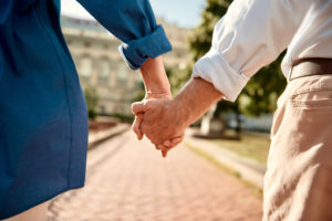 Older Couple Holding Hands