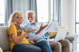 Couple looking over medical bills