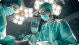 Doctors in scrubs about to work on a patient