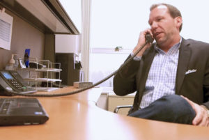 Sokolove lawyer Ricky LeBlanc taking a call with a client about their mesothelioma lawsuit