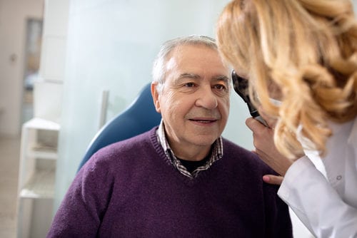 Veteran getting eye examination.