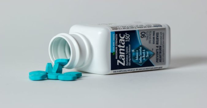 bottle of zantac pills laying on its side